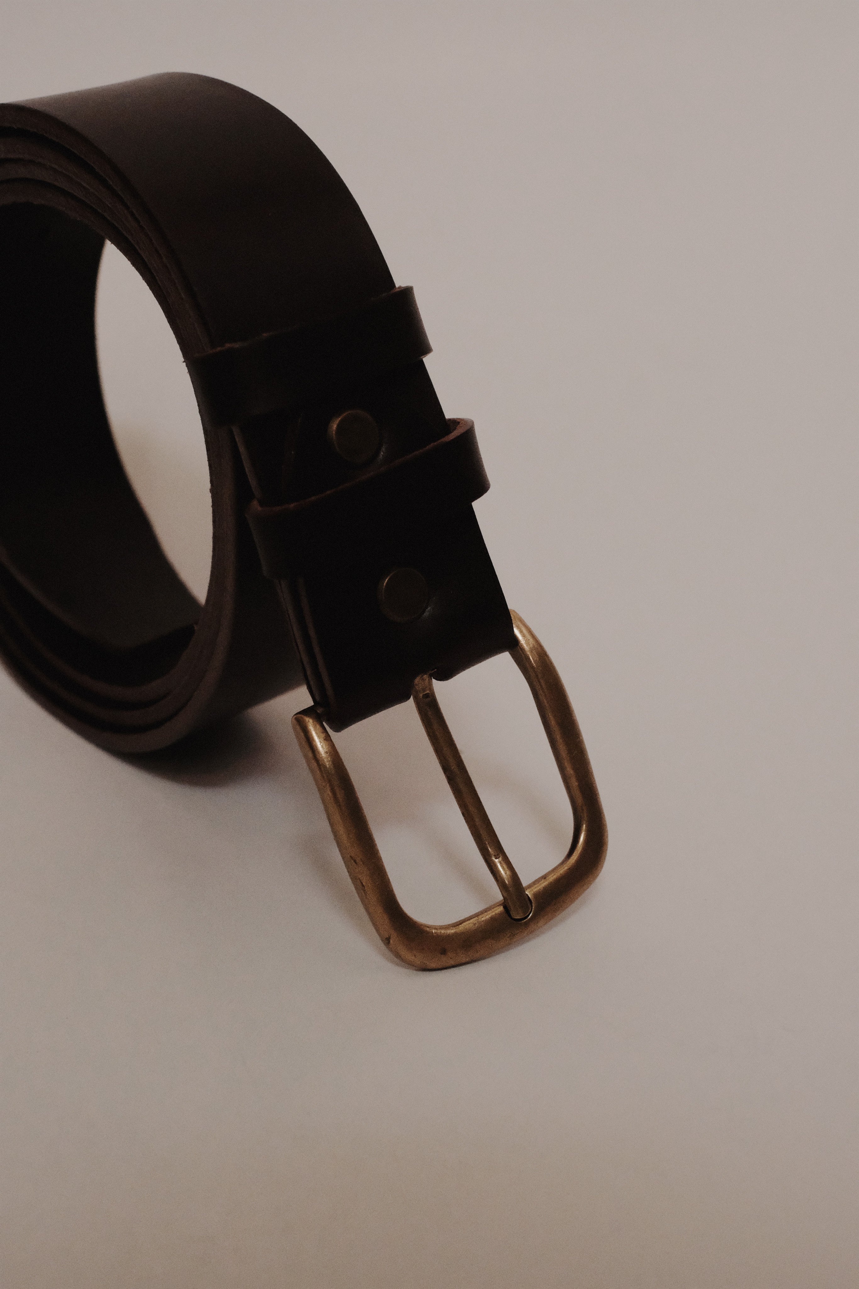 Dark brown brass