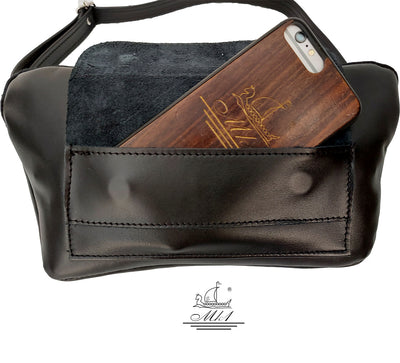 Leather handcrafted waist bag. mp2