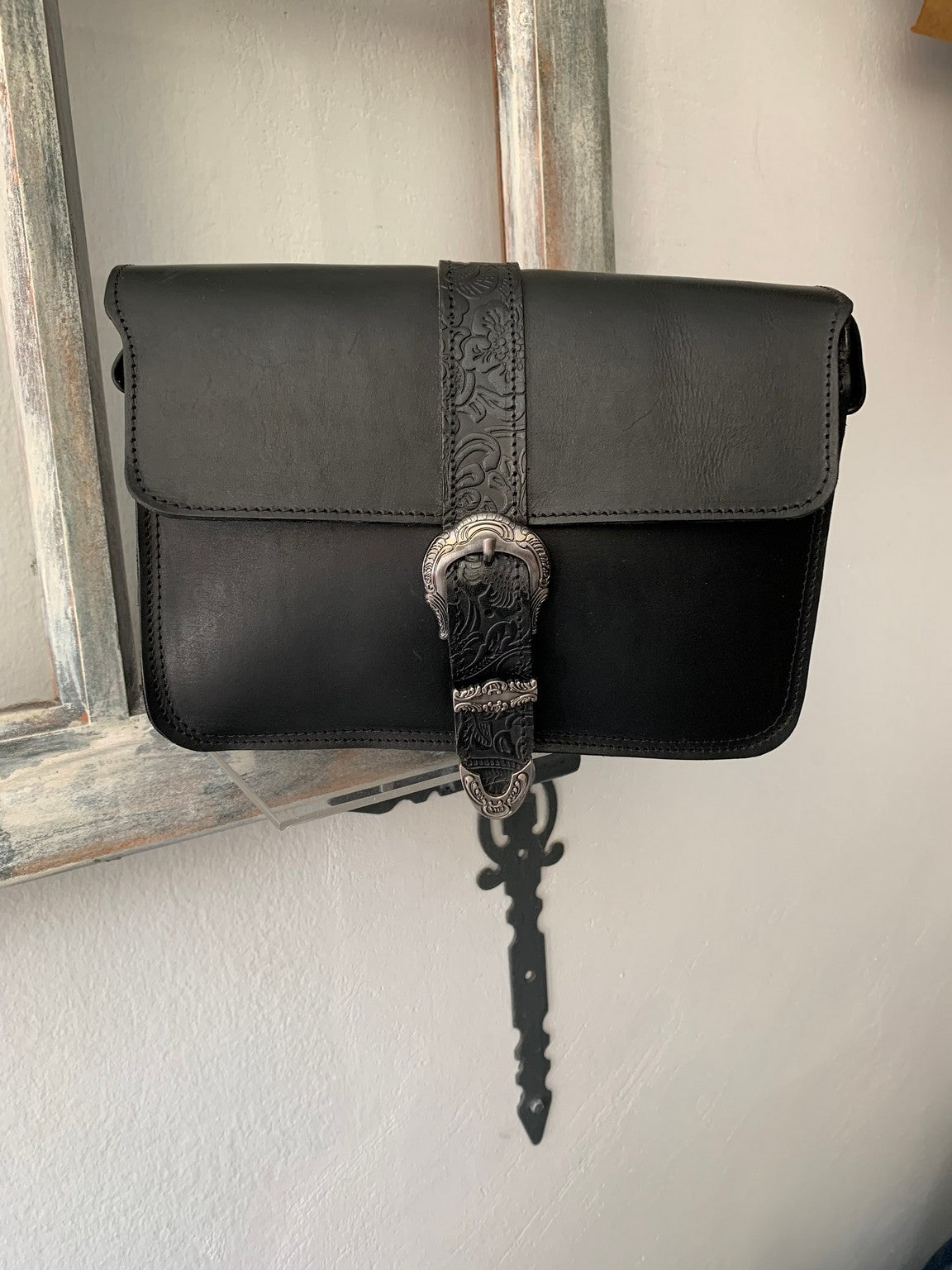 "Hellen" - midsize crossbody bag handcrafted from natural black leather with flower details WT/319M
